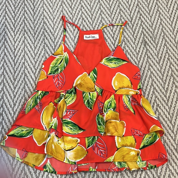 Red flowy/ruffled tank with lemon print. NWOT never worn!! Size S-M. - Picture 3 of 3